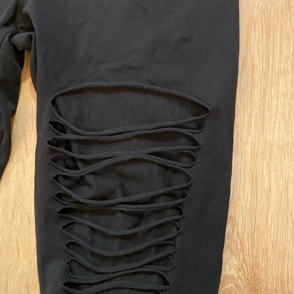 Express distressed leggings. Leggings with slits. Woman’s size is petite large - Picture 11 of 14